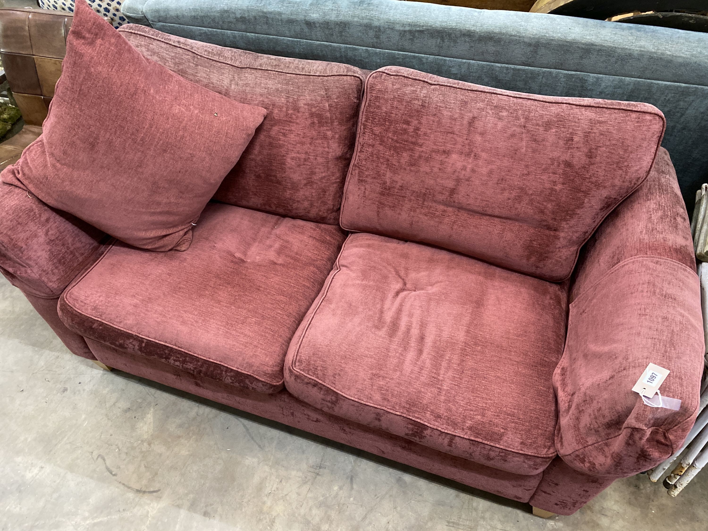 A contemporary plum fabric two seater settee, length 176cm, depth 84cm, height 86cm